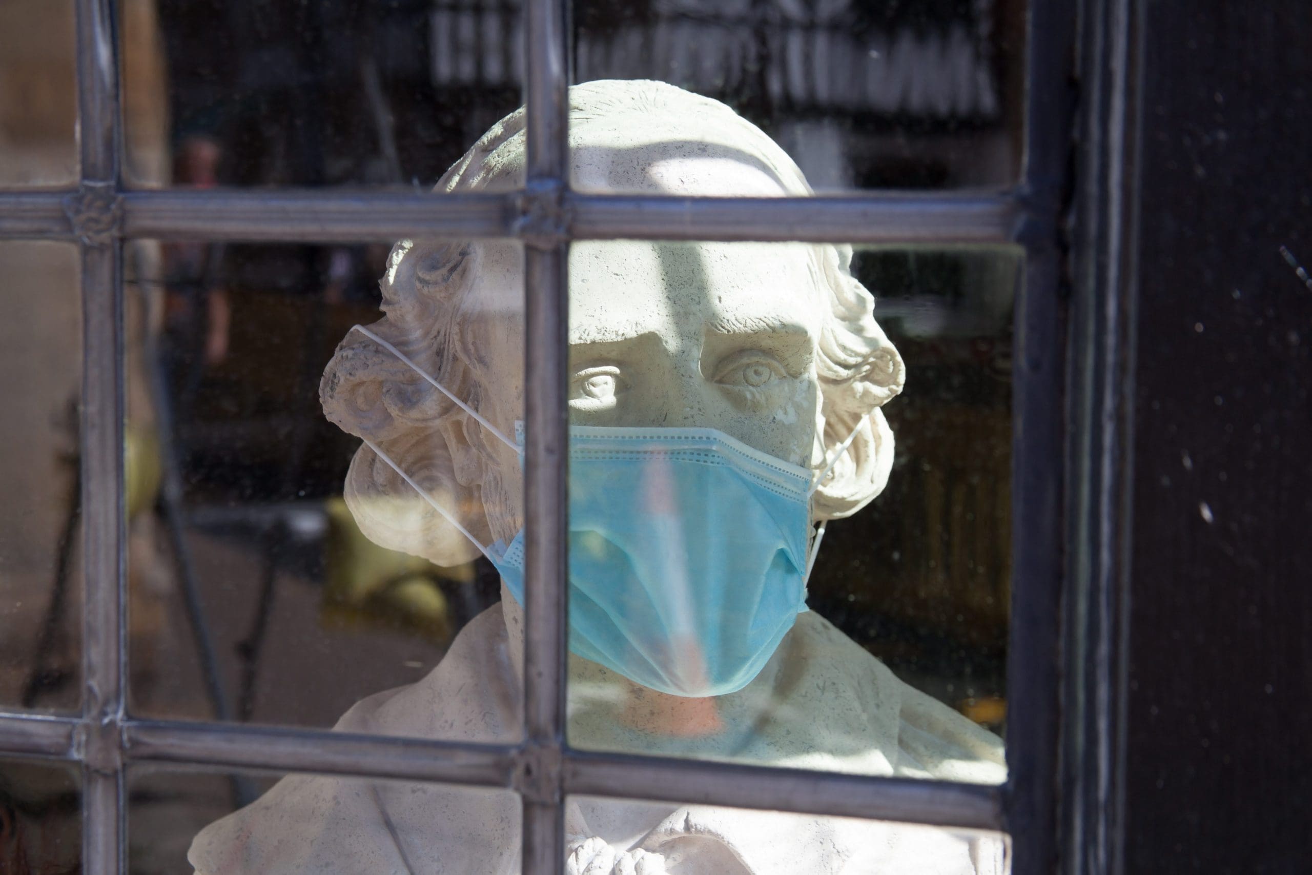 bust of Shakespeare wearing a mask
